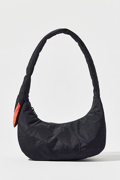 Iconic BAGGU bag in a draped swan silhouette. Shoulder bag style in heavyweight nylon with a zip pocket inside and a padded shoulder strap. Features BAGGU swan bag BAGGU shoulder bag Draped swan silhouette Medium size that fits the essentials Interior zip pocket Padded shoulder strap Zipper closure Content + Care Recycled heavyweight nylon Spot clean Imported Size Dimensions: 11" w x 3.14" d x 5" h | BAGGU Swan Bag in Black, Women's at Urban Outfitters Swan Bag, Swan Silhouette, Baggu Bag, Baggu Bags, Bag Style, Reusable Bags, Nylon Bag, Black Fits, Inside Pocket