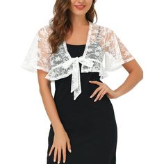 An elegant shrug with flowy trim offers a charming look for day or night. This lace floral cardigan features a ruffle hem and cropped fit, perfectly covered up with sleeveless dresses for a wedding/evening look. Suitable for casual, work, dates, weddings, evening parties, cocktails, nights out, and daily wear. Modern and elegant, this cardigan style with softly lace fabric. A must-have in your clothing wardrobe, the bolero has ruffle sleeves, a ruffle hem, and a semi-sheer design, and finished w Spring Party Lace Shrug, Spring Party Shrug With Lace Trim, Spring Lace Shrug With Lace Sleeves, White Party Shrug For Spring, Elegant Shrug, Dresses For A Wedding, Short Sleeve Shrug, Shrug Top, Clothing Wardrobe