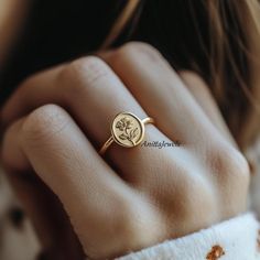 Round Gold Signet Ring, Flower Signet Ring, Engraved Flowers Ring, Gold Flowers Signet Ring, Dainty Flower Ring, Designer Women's Ring Details:  💙Item: Flowers Signet Ring 💙Metal : 925 Sterling Silver 💙Size : Select From variations  AnittaJewels These items are handmade, All are designed and handmade in-house by me and team with precision, Perfect craftsmanship and strong interest! We are continuously listing new products in our store. So keep coming back to see more great updates in the store. The amazing quality & best price! Wholesale orders With Custom are welcome to message me for pricing information. Product color may slightly vary due to photographic lighting sources or your monitor setting. Kindly look for the beautiful and eye tempting jewelry at my store -  https://www.etsy.co Woman Signet Ring, Vintage Engraved Flower Ring For Gift, Gold Wedding Signet Ring With Birth Flower, Nature-inspired Gold Flower Ring With Birth Flower, Elegant Gold Signet Ring With Birth Flower, Vintage Engraved Yellow Gold Flower Ring, Flowers Ring, Signet Rings Women, Rings Women