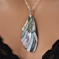 "♥ Ready to ship ♥ 100% handmade ♥ Packed in a gift box ♥ Length chain 16,18,20,22, or 24 inches (customer choice) ♥ Pendant size 5cm x 7cm The mother of pearl pendant necklace is a stylish, elegant, luxury accessory. Absolutely gorgeous, feminine & romantic, tasteful but eye-catching! Timeless, feminine, and graceful jewelry. Add a pair of matching earrings to create an elegant ensemble. This is a perfect necklace for many occasions and would be a fantastic present! All my items are beautifully Unique Teardrop Pendant Necklaces As Gift, Teardrop Large Pendant Jewelry For Gifts, Unique Teardrop Pendant Necklace As Gift, Artisan Teardrop Jewelry For Gifts, Teardrop Large Pendant Jewelry As Gift, Teardrop Large Pendant Jewelry Gift, Handmade Teardrop Necklace For Her, Silver Teardrop Necklaces With Unique Variations, Handmade Teardrop Necklace As Gift For Her