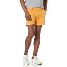 Upgrade your summer wardrobe with these sleek Slim Fit Flat Front Chino Shorts. Crafted from a soft and durable cotton blend with a touch of elastane, these shorts offer a comfortable fit with just the right amount of stretch. With a button closure and button-through back pockets, they are both stylish and functional. Details: 98% Cotton, 2% Elastane Button closure Machine Wash Fitted through hip and thigh, with a tapered leg. Sits below the waist Soft, durable cotton blend with a gentle stretch Casual Cotton Bottoms For Warm Weather, Cotton Bermuda Shorts With 5-inch Inseam For Summer, Casual Elastane Bottoms For Beach, Casual Elastane Beach Bottoms, Casual Short Bottoms For Warm Weather, Summer Cotton Bermuda Shorts, Casual Short Length Bottoms For Warm Weather, Casual Bottoms For Warm Weather In Short Length, Cotton Shorts For Warm Weather In Summer