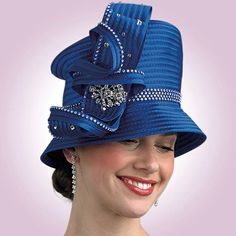 Discover the epitome of elegance with the Lily And Taylor H285 Church Hat, a statement piece designed to elevate your attire for any special occasion. This stunning hat boasts a unique and eye-catching design that merges classic style with a modern twist, ensuring that it stands out in the best possible way. The craftsmanship of the hat is unmatched, assuring not only an appealing look but also longevity and durability. Made from high-quality materials, the hat is constructed to provide a comfor Elegant Curved Brim Top Hat For Formal Occasions, Chic Mini Hat With Structured Crown For Church, Elegant Adjustable Hats For Church, Gatsby Style Mini Hat With Short Brim For Evening, Elegant Wide Brim Top Hat For Formal Occasions, Elegant Adjustable Top Hat, Evening Gatsby Mini Hat With Short Brim, Luxury Adjustable Headpieces For Formal Occasions, Chic Formal Fitted Top Hat