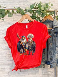 Indigenous Eagle Couple Shirt, Native Chief Shirt, Native American Tee, American Native Art, Indigenous shirt, Proud Indigenous shirt, Melanin shirt, Native American shirt for women or men, Native shop, American Indian Shirt, MMIW Shirt, Equality Shirt For Women,  ➤HOW DO I KNOW WHAT SIZE FITS ME BEST To See Our Size Chart, Please Make Sure To Scroll Through The Photos. The Measurements For Our Shirts Are Listed There As Well. These Are A Unisex Fit, So They Will Be Looser If You Order Your Normal Women's Size. For A More Fitted Look, Most People Will Size Down. Please Keep In Mind That Our Size Chart Measurements Are Not in Circumference. ➤EASIEST WAY TO ORDER 1. First, Make Sure That You Have Read All Relevant Information. You Have Scrolled Through All Of The Photos 2. Once That Has Been Native American Ribvom Shirts, Mmiw Shirt, American Native Art, Eagle Couple, Native American Shirt, Native American Eagle, Native Clothing, Men Native, Native American Shirts