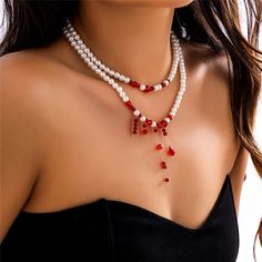 Features: Expertly crafted with a unique multilayer design, this choker necklace features a stunning blood pattern imitation pearl pendant. Perfect for women looking to add a touch of gothic elegance to their bridal or Y2K look. Make a statement with this one-of-a-kind piece of jewelry. Pearl Cosplay, Long Snake, Thigh Chain, White Beaded Necklaces, Pendant Choker Necklace, Pearl Chain Necklace, Y2k Jewelry, Snake Pendant, Gothic Necklace