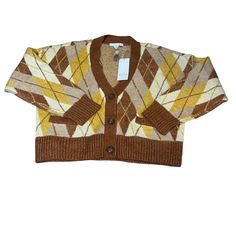 Elevate Your Style With This Trendy Argyle Cardigan Sweater From Design History. Featuring A Beautiful Combination Of Rust And Yellow Colors, This Sweater Is Perfect For Any Occasion. The Tight-Knit Pattern And Relaxed Fit Provide Comfort And Style. Casual Yellow Winter Cardigan, Retro Yellow Cardigan For Spring, Yellow Retro Cardigan For Spring, Yellow V-neck Cardigan For Fall, Casual Mustard Cardigan For Winter, Casual Yellow Fall Cardigan, Yellow Long Sleeve Cardigan For Fall, Retro Yellow Sweater For Fall, Trendy Mustard Sweater For Fall