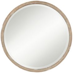 the round mirror is made from wood and has a light brown frame with white trim