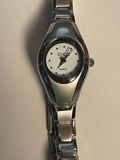 Vintage Gucci women'w quartz wrist watch Needs a new battery Great condition, minimal signs of wear Measures 7.5" end to end See pictures for additional details Cheap Vintage Women's Watch Accessories, Cheap Vintage Formal Watches, Ladies Wrist Watch, Time Clothes, Fancy Watches, Vintage Watches Women, Gucci Vintage, Gucci Watch, Concert Fits