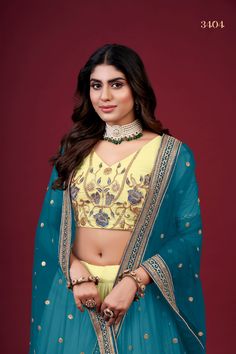 This Yellow Faux Georgette Lehenga Choli Set with Dupatta is adorned with intricate Zari, Thread & Sequins Embroidery, giving it a timeless and classic look. It includes a 3.5 Meter-long lehenga, a blouse with Regular Sleeves and a 2.30 Meter-long dupatta. The fabric is extra-soft and can be customized to your measurements. Washing instructions: Dry Clean. No of Set - 3-piece set Color- Yellow Lehenga Choli Fabric - Faux Georgette Stitch Type - Semi-Stitched (Standard Cancan & Canvas Attached) F Yellow Lehenga Choli, Georgette Lehenga, Yellow Lehenga, Embroidered Lehenga, Sequins Embroidery, Embroidery Blouse, Lehenga Choli, Indian Wear, Classic Looks