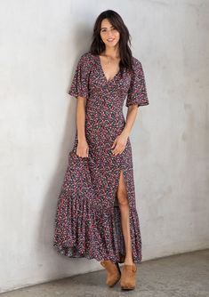 [Color: Black/Fuchsia] This effortless and feminine style features flattering short flutter sleeves Bohemian Ditsy Floral Maxi Dress For Brunch, Flowy Ditsy Floral Print Maxi Dress, Casual Maxi Dress With Ditsy Floral Print, Bohemian Fitted Dress With Side Slits, Fitted Bohemian Dress With Side Slits, Chic Flowy Maxi Dress With Ditsy Floral Print, Flowy Ditsy Floral Maxi Dress, Casual Rayon Maxi Dress With Flutter Sleeves, Fitted Flutter Sleeve Maxi Dress For Vacation