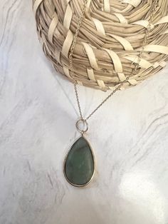 "Jade Teardrop stone itself has a beautiful green hue. This stone was created and polished by authentic lapidary process. Set in a imitation gold teardrop and gold chain. All Ilustre Stones are created individually unique in their own way. This beautiful pendant is a one and only in this shop.  Measurements: Pendant - 1 1/2\" Chain - 8\"  Includes complimentary black jewelry gift box" Spring Hill, Aquamarine Stone, Black Jewelry, May 22, Jewelry Gift Box, One And Only, Jewelry Gift, Gold Chain, Pendant Necklaces