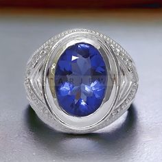 a blue ring sitting on top of a table