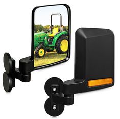 a tractor is shown in the side view mirror and on the other side of the truck