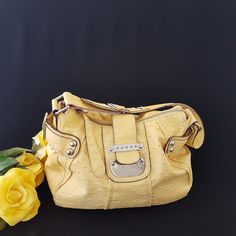 "Vintage GUESS hobo shoulder bag with faux yellow ostrich leather and silver hardware. Zippered top closure, with additional magnetic snap (at the back of the purse). Inside lining of GUESS print. Small side zippered pocket and 3 slip pockets.  Adjustable shoulder strap with 3 adjustments.  Pictures taken in natural light and a bright yellow rose prop to help with the color. Dimensions: \" 8.5 (h) x 10.5\" (l) x 5\" (w) with 9.5\" drop (currently) Tag:  \"11120667 VO049301 F-10\" Vintage Conditi Guess Bag, Ar Accessories, Room Stuff, Cell Phone Holster, Hobo Shoulder Bag, Phone Holster, Ostrich Leather, Zipper Top, Walker Boots