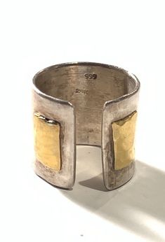 Artisan 999 Fine Sterling Silver & 24k Solid Gold Modernist Cuff Ring. Adjustable ring, approximately size 9. Approximately 16.9 grams Cuff Ring, Cuff Rings, Adjustable Ring, Adjustable Rings, 16 9, Favorite Jewelry, Solid Gold, Jewelry Watches, Jewelry Rings