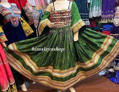 Festival Floor-length Dress With Pallu, Bohemian Dresses With Zari Work For Festival, Bohemian Dresses With Dabka For Navratri, Bohemian Dabka Maxi Dress For Wedding, Bohemian Gown For Festivals, Bollywood Style Dabka Dress For Festival, Traditional Green Maxi Dress, Bohemian Dabka Lehenga For Eid, Bohemian Lehenga With Dabka For Eid