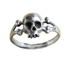 So delicate from afar people will think you're a good girl. And then they get to know you...Dimensions:  Skull measures 10mm tall.Materials: Sterling Silver: Solid sterling silverGold Plate: 14K gold plate over sterling silver10K Gold: Solid 10K gold14k Gold: Solid 14K goldIf you would like this ring in a metal or size that you don't see listed just send us an email and we can probably make it custom for you. anomalyjewelry@gmail.comAll jewelry made in N.Y.C. by my hands at the time of purchase Adjustable Skull Rings With Symbolic Style, Adjustable Skull Print Rings For Gift, Nickel-free Skull Rings For Gift, Sterling Silver Skull Print Rings As Gift, Sterling Silver Rings With Skull Print For Gift, Afar People, Pirate Accessories, Nyc Studio, Bone Jewelry