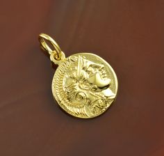 Athena golden pendant, Athena pendant, ancient coin pendant, coin pendant, greek coin pendant, coin necklace, ancient coin, antique coin, antique coins, greek jewelry, Athena, Athena jewelry "Athena" is a golden pendant - an ancient coin representing the Greek goddess Athena. Athena is the goddess of wisdom, courage, and craft. She is the archetype of a strong, brave woman, boldly striding across life, whose greatest strength is her outstanding intelligence.   The pendant showcases Athena's magn Ancient Yellow Gold Coin Pendant Jewelry, Yellow Gold Amulet Coin Necklace, Bronze Coin Necklace, Byzantine Style Medallion Coin Necklace, Yellow Gold Coin Pendant Necklace In Amulet Style, Ancient Style Medallion Coin Pendant Jewelry, Ancient Yellow Gold Medallion Necklace, Ancient Style Yellow Gold Medallion Necklace, Bronze Coin Pendant Medallion Necklace