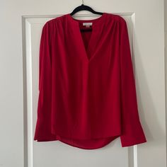 Color: Tomato Red Condition: New Without Tags Size: M Long Sleeve Blouse With Notched Collar. Elegant Calvin Klein Tops For Fall, Chic Red Top For Workwear, Fall Calvin Klein Workwear Blouse, Calvin Klein Tops For Fall Workwear, Chic Red Blouse For Work, Red Spring Blouse For Work, Red Spring Blouse For Workwear, Calvin Klein Fall Workwear Blouse, Chic Red Office Top