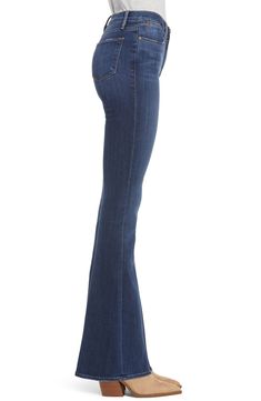 A high waist balances the floor-sweeping flared legs of retro-inspired jeans cut from premium stretch denim that's whiskered and faded to a just-right hue. 34" inseam; 21" leg opening; 10" front rise; 14" back rise (size 29) Zip fly with button closure Five-pocket style 44% cotton, 42% lyocell, 13% polyester, 1% elastane Machine wash, tumble dry Imported Denim Flares With Five Pockets, Modern Dark Wash Mid-rise Flare Jeans, Modern Mid-rise Denim Blue Flare Jeans, Modern Mid-rise Flare Jeans In Denim Blue, Chic Medium Wash Full Length Flares, Modern Fitted Full Length Flare Jeans, Fitted Flare Jeans With Five Pockets, Chic Full-length Denim Flares, Modern Fitted Flare Jeans