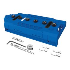 a blue tool box with tools in it and some screws on the inside side