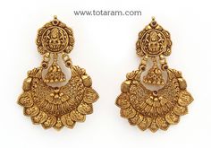 Temple Jewellery - 22 Karat Gold "Lakshmi" Drop Earrings (Chand Bali) with Beads

Enhance Your Beauty with Exquisite Indian Gold Jewelry  Indulge in the rich tradition of Indian craftsmanship with our stunning Temple Jewellery collection. Our 22 Karat Gold "Lakshmi" Drop Earrings, also known as Chand Bali, are a true masterpiece that will elevate your style to new heights. Adorned with intricate beads and designed to perfection, these earrings are a symbol of elegance and grace.  Feel Like Royal Temple Chandbali Earrings, Gold Temple Jewelry Chandbalis, Gold Temple Jewelry Jhumkas With Zari Work, Gold Jhumkas With Zari Work For Navratri, Navratri Gold Danglers With Zari Work, Traditional Gold Chandbalis With Peacock Design, Heavy 22k Gold Chandbalis For Festivals, Gold Earrings With Peacock Design For Puja, Gold Chandbalis With Peacock Design For Diwali