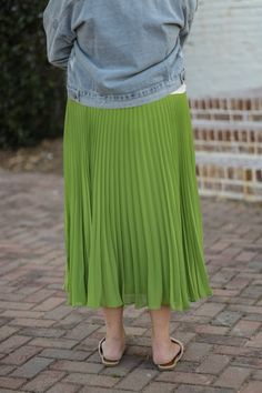 The Chasity Pleated Skirt has such an elegant style! This midi length skirt is fully lined and is detailed with accordion pleats. This flowy, fun skirt is perfect to jazz up your style! - Elastic waistband - Accordion-style pleats - Midi length - Fully lined - Material: Self: 100% Polyester | Lining: 100% Polyester - Model is wearing a small Color Disclaimer: Actual colors may vary due to computer monitors. *Measurements are taken flat, and then doubled.* Size Waist Length Small 25" 32" Medium 2 Accordion Pleats, Skirts For Kids, Boys Denim, Midi Length Skirts, Sweater Dress Midi, Sweater Set, Computer Monitors, Waist Length, Wedding Bridesmaids