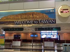 there is a sign that says welcome to taiwan at the airport