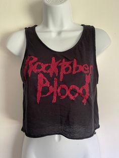 This item is ONE OF A KIND and once it's gone, it's gone for good! Girls top handmade from scratch with black 4-way knit. Red print on front with long sleeves and tons of stretch. All seams serged and top stitched. Size L Bust - 36-48" Length -17" Halloween Fitted Crop Top, Edgy Fitted Tank Top For Fall, Stretch Tops For Halloween Concert, Stretch Tops For Concert And Halloween, Alternative Black Crop Top, Alternative Style Black Crop Top, Fitted Alternative Top For Concert, Fitted Alternative Top For Concerts, Fitted Alternative Style Top For Concerts