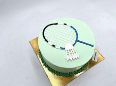 a cake with a tennis racket on it