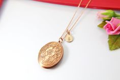 "This is a brass locket charm with hand-stamped initial charm on Rose Gold over a stainless steel 18 inches chain. I do not put the photo to the locket **Available in gold, rose gold, bronze, and silver * You will receive 1 necklace** HOW TO ORDER 1) Select the quantity 2) Select stamp the initial 3) Add to cart DESCRIPTION ♥ 18K real gold plate brass chain, real rose gold plated brass chain, brass chain or 304 stainless steel chain about 18 inches ♥ 18K real gold plate brass, real rose gold pla Rose Gold Locket Necklace With Charms For Gift, Gold Engraved Locket Necklace For Mom, Engraved Gold Locket Necklace For Mom, Rose Gold Brass Charm Necklace For Gift, Rose Gold Brass Charm Necklace As Gift, Engraved Rose Gold Locket Necklace For Anniversary, Mother's Day Engraved Rose Gold Locket Necklace, Engraved Rose Gold Locket Necklace For Personalized Gift, Antique Engraved Charm Necklaces For Gift