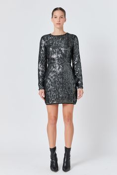 Look effortless and stylish in this gorgeous Open Back Sequin Dress. Crafted from shimmering sequined fabric with a round neckline and long sleeves, this dress oozes sophistication. Its open-back detail adds a touch of glamour, making this piece the perfect party dress. Stand out in the crowd with this stunning dress and be the center of attention. Highlight your curves by pairing this dress with heels and a clutch. Sequined fabric Round neckline Long sleeves Open back Metal zip closure Lined Ha Sequined Fabric, Jumpsuit Fall, Knitwear Trends, Dress Stand, Tweed Dress, Blazer And Shorts, Heat Styling Products, Leather Dresses, Silver Dress