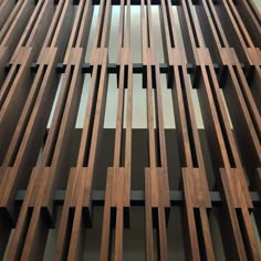 a close up view of the wooden slats on a building's side wall