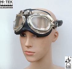 20% OFF WAS $188 NOW $150 Handmade retro futuristic, aviator,goth Steampunk goggles from Hi Tek Designs London. Has British made stainless steel lenses. Chunky solid construction with adjustable strap to fit any size head. suit for performance,magazine shooting,vedeo,party，club，collecting. Details Unisex Black leather strap. Silver metal brow . Stainless steel lenses in fish net design. Very unique design with black skull on the nose bridge . Measurement length of the frame is 20cm You can wear Futuristic Headpiece, Sci Fi Cosplay, Steampunk Motorcycle, Aviator Goggles, Goth Steampunk, Net Design, Steampunk Goggles, Fish Net, Black Skull