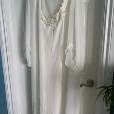 Never Worn Beautiful White Nightgown And Matching Robe. Embroidery On Nighty And Robe. Pictures Do Not Do It Justice. Very Beautiful!!!! This Beautiful Set Will Really Show Off Your Tan!!!! Long Sleeve Lace Nightgown For Sleep, Lace Long Sleeve Nightgown, Long Sleeve Lace Trim Nightgown For Wedding, Sheer Long Sleeve Wedding Nightgown, V-neck Robe With Lace Trim For Wedding Night, Wedding Nightgown With Lace Trim And Long Sleeves, Long Sleeve Lace Trim Wedding Nightgown, Sheer V-neck Sleepwear For Wedding, White Lace Long Sleeve Nightgown