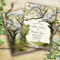 two wedding cards with trees and flowers on them