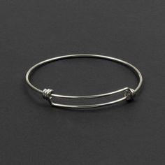 Silver 304 Stainless Steel 1.6x64mm Adjustable Bangle Bracelet - 1 bracelet - Stainless steel won't tarnish and is perfect for your next jewelry design. Each bracelet is approximately 1.6mm thick. Bracelets, $4 Deals, Stainless Steel Bracelets, Stainless Steel Bracelets, Cherry Tree Beads, Silver 304 Stainless Steel 1.6x64mm Adjustable Bangle Bracelet - 1 bracelet Adjustable Silver Stainless Steel Wristband, Adjustable Minimalist Stainless Steel Bracelets, Silver Metal Bangle Wristband, Silver Metal Bangle, Modern Adjustable Charm Bracelet With Extender, Adjustable Silver Stainless Steel Bracelets, Adjustable Stainless Steel Wristband, Everyday Metal Bangle, Flexible Silver Metal Bangle