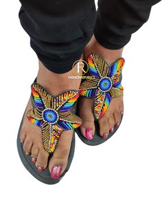 African Sandals. Made using high quality leather And beads. Beaded Round Toe Sandals For Beach, Summer Beaded Slip-on Sandals, Multicolor Leather Toe Post Sandals, Beaded Slip-on Sandals For Summer, Handmade T-strap Sandals For Beach, Handmade T-strap Sandals For Beach With Round Toe, Handmade T-strap Sandals With Round Toe For Beach, Handmade Round Toe Sandals For Beach, Handmade Multicolor Beach Sandals