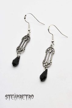 "These fantastic victorian style filigree earrings are part of our new Dark Gothic range, and are a step away from our previous steampunk work. There are numerous Gothic designers out there, and various marketplaces to purchase Gothic jewellery, but i am sure you will like what we are doing here Growing up in the 80's i lived through the \"goth\" movement, many a lost weekend was spent watching Bauhaus, Sisters, Nephilim etc, travelling to gigs all around the U.K, and one of the most interesting Victorian Black Pierced Earrings, Black Victorian Pierced Earrings, Antique Black Pierced Earrings, Victorian Black Earrings For Evening, Black Victorian Earrings For Evening, Antique Black Drop Earrings, Black Antique Drop Earrings, Black Vintage Pierced Earrings, Vintage Black Pierced Earrings