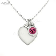 Description Opt for a wonderful and quirky piece of jewelry that will match your needs for simplicity. This smashing piece is timeless and perfect for daily wear. The natural pink tourmaline shines brightly against the backdrop of a 14k solid white gold-plated heart. The whole look will mesmerize and captivate you, and you will not hesitate before adding it to your jewelry collection. This 14k solid gold solitaire necklace is perfect for flaunting your dainty style with a touch of glamour. Minim October Gemstone, Dainty Style, Solitaire Necklace, Tanzanite Stone, Solid Gold Chains, Classic Necklace, Solitaire Necklaces, Tourmaline Necklace, Tourmaline Stone