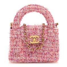 This is an authentic CHANEL Tweed Quilted Mini Nano Kelly Shopper in Pink. This mini bag is crafted of tweed fabric in shades of pink. It features a long crossbody chain strap threaded with pink leather, dual tweed top handles, and a Chanel CC turn-lock at the flap. This opens to a compact matching leather interior with a patch pocket. Chanel Tweed Bag, Mini Kelly, Tweed Bag, Tweed Top, Chanel Tweed, Tweed Fabric, Shades Of Pink, Pink Leather, Leather Interior