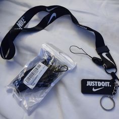 This Nike Lanyard Has It All! Not Only Is Is A Silky Like Feeling But It's Got The Classic Black With The White Nike Writing And Swoosh! It Comes With A Keychain That You Can Attach To The Claw Clip On The Lanyard Or To Your Keys, As Well As A Plastic Detachable Part For A House Key Or Special Key Of Any Kind. I Do Have Multiples Of These Left. Bundle For Personal Discount. Free With All Purchases... Short Lanyard Keychain, Car Key Lanyard, Nike Keychain, Nike Lanyard, Lanyard Keychain, School Things, Nike Accessories, The Claw, White Nike