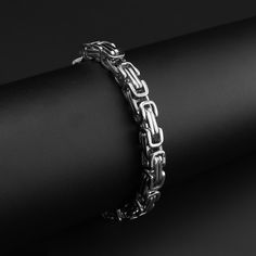 The Stainless Steel Byzantine Bracelet is made of premium stainless steel with a polished finish that offers durability with a touch of luxury. This is a great everyday bracelet that can be stacked with others or can be worn as a statement piece to wear out for special occasions. The Stainless Steel Byzantine Bracelet features a unique byzantine chain style that looks great on both Men and Women. Wear your new Stainless Steel Byzantine Bracelet without worry in the water or while you sweat, all Byzantine Bracelet, Byzantine Chain, Biker Jewelry, Everyday Bracelet, Motorcycle Women, Skull Ring, Black Stainless Steel, High Quality Jewelry, Chain Styles