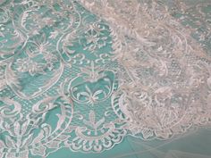 "off white lace fabric ,wedding lace ,grass and leaves embroidery lace -9162 Color:off white The real color may be slightly different from the pictures shown on website caused brightness of your monitor and light brightness. Width130CM(51\") Place of origin:China Material:Micro Fiber(polyester&nylon) and mesh ground All the lace are perfect for lingerie, bra, dresses, dolls, bridal veil, altered art, couture, costume, jewelry design, pillowcase, home decor and other projects you could imagin Elegant Embroidered White Lace, Elegant White Lace With Intricate Embroidery, Elegant Embroidered White Tulle Fabric, Elegant White Embroidered Tulle Fabric, Elegant Embroidered Lace Tulle Fabric, Elegant Embroidered Lace For Spring, Elegant White Lace With Floral Embroidery, Elegant Embroidered Spring Lace, White Embroidered Lace For Ceremony