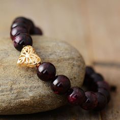 Garnet Stone Bracelet Our Handmade Garnet Stone Bracelet is a harmonious blend of elegance and metaphysical allure. These unique bracelets are not just accessories; they are a symbol of craftsmanship, designed to bring protection and health into your life. Garnet: A Gem of Profound Significance This gemstone, often associated with love and loyalty, carries a rich history and a wealth of healing properties that make it a favorite among gemstone enthusiasts. Each of our Garnet bracelets is handmad Garnet Bead Bracelet, Sea Opal, Garnet Heart, Survival Instinct, Garnet Bracelet, Natural Stone Bracelets, Garnet Stone, Unique Bracelets, Stone Pendant Necklace