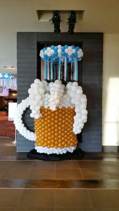 a beer themed balloon sculpture in the lobby