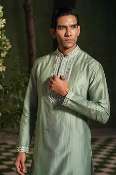 Turquoise full sleeve kurta with thread, sequin embroidered placket. Paired with churidar. - Aza Fashions Long Sleeve Cotton Silk Sherwani With Dabka Work, Festive Pista Green Long Sleeve Kurta, Festive Long Sleeve Pista Green Kurta, Pista Green Long Sleeve Sherwani With Cutdana, Pista Green Long Sleeve Kurta For Transitional Season, Pista Green Long Sleeve Kurta, Pista Green Long Sleeve Traditional Wear For Diwali, Pista Green Bandhgala With Chikankari Embroidery, Pista Green Long Sleeve Sherwani For Eid