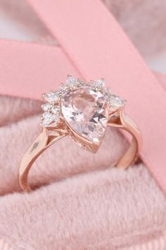 Morganite Teardrop Wedding Jewelry, Teardrop Morganite Wedding Jewelry, Elegant Teardrop Morganite Rings, Morganite Teardrop Jewelry For Wedding, Morganite Gemstone Jewelry For Proposal, Pear-shaped Morganite Jewelry, Pink Pear-shaped Gemstone Rings, Morganite Pear-shaped Wedding Rings, Pink Gemstone Cluster Ring For Wedding