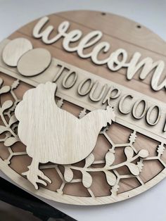 a wooden sign that says welcome to town