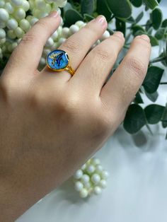 Beautiful blue color ring for any occasion. Every ring is hand painted with hand placed delicate pieces of seashells and metallic leaves. Made to order and with attention to detail, this ring will be perfect for your jewelry collection. - Ring is gold plated - Ring is adjustable Ocean-inspired Blue Ring For Gift, Ocean-inspired Blue Ring For Gifts, Ocean-inspired Blue Rings As Gifts, Blue Nature-inspired Ring For Gift, Seashell Rings, Seashell Ring, Dried Flower Resin, Blue Seashell, Flower Resin Jewelry