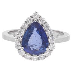 Item Code :- SER-22449 Gross Wt. :- 4.62 gm 18k White Gold Wt. :- 3.94 gm Natural Diamond Wt. :- 0.56 Ct. ( AVERAGE DIAMOND CLARITY SI1-SI2 & COLOR H-I ) Blue Sapphire Wt. :- 2.85 Ct. Ring Size :- 7 US & All size available ✦ Sizing ..................... We can adjust most items to fit your sizing preferences. Most items can be made to any size and length. Please leave a note at checkout or contact us via 1stDibs conversation. Even after purchasing the item, you can still ask us to adjust the size or length. We will try our best to fix it if it is possible. ✦ Import Duties, Taxes and Custom Charge ..................... Import duties, taxes and customs charges are not included in the items price or shipping cost. These charges are the buyer's responsibility. Please check with your country's